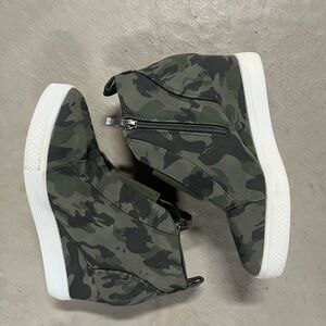 Camo wedge sneakers.